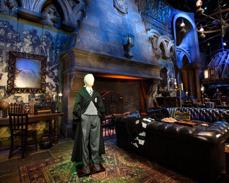 draco malfoy costume in the slytherin common room set at warner bros. studio tour london - the making of harry potter