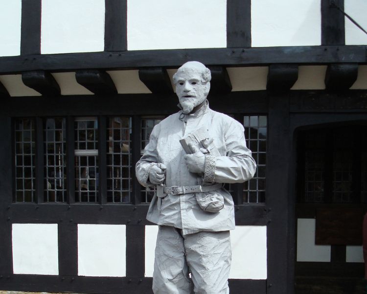 a statue of william shakespeare in straford upon avon