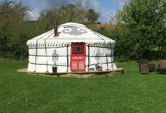one of the devon yurts in a  field