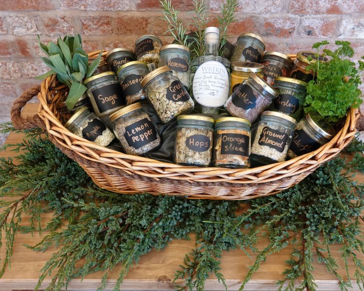 basket of herbs and botanicals used in gin making seen on a gin making experience in shropshire