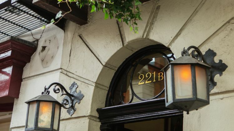 Photo of the top of the door to 221 B in london home of sherlock holmes