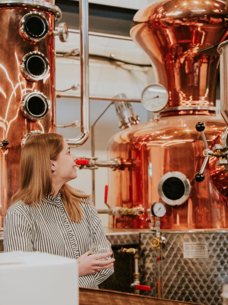 woman on gin making experience in cheltenham