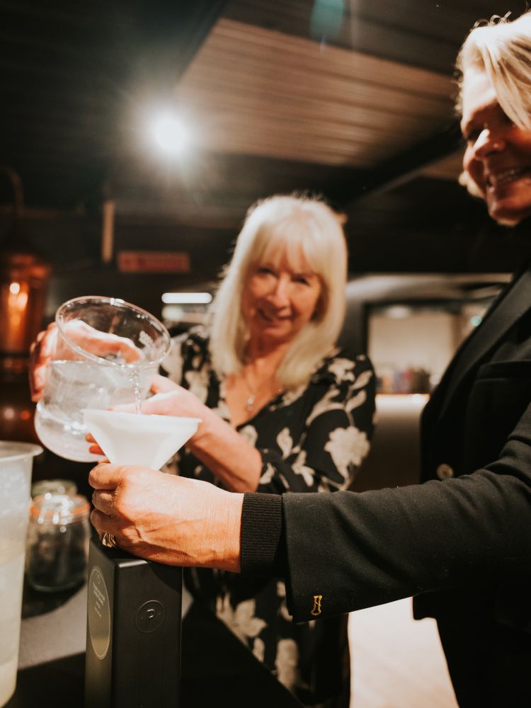 woman on gin making experience in cheltenham