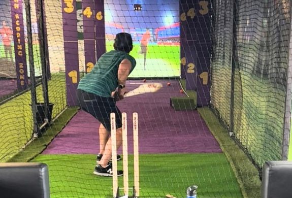 Playing virtual cricket