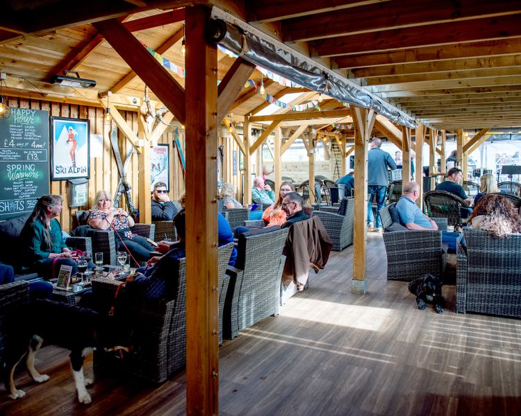 the interior of monty's bar on a glamping site in dorset