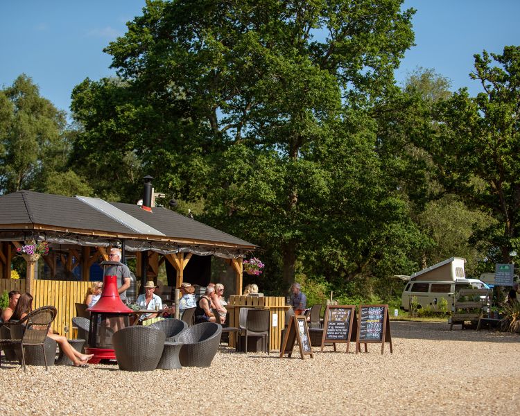the exterior of montys bar on a glamping site in dorset
