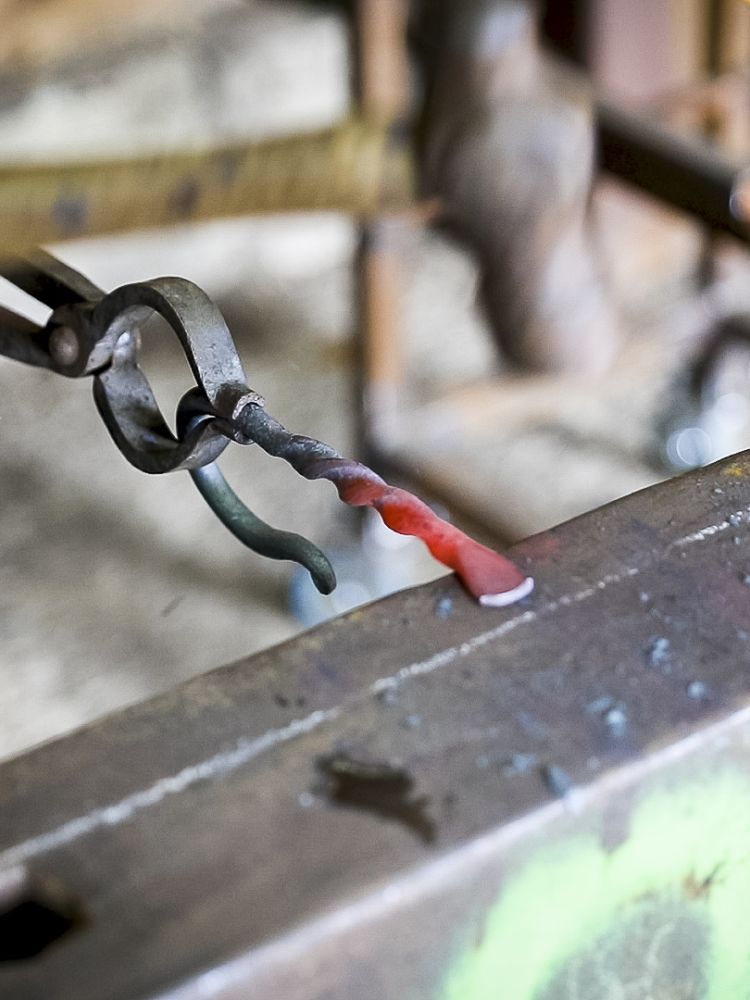 the hook for a poker being made on a blacksmith experience