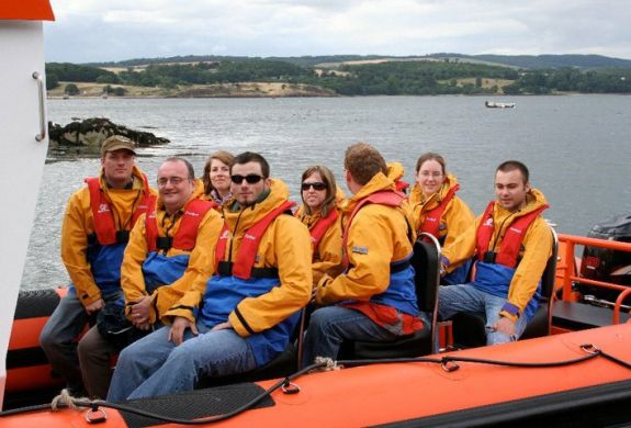 passengers sat on a boat ready for a high speed boat trip from south queensferry in scotland