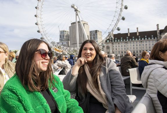 Two Guests Smiling on the London Sightseeing River Cruise
