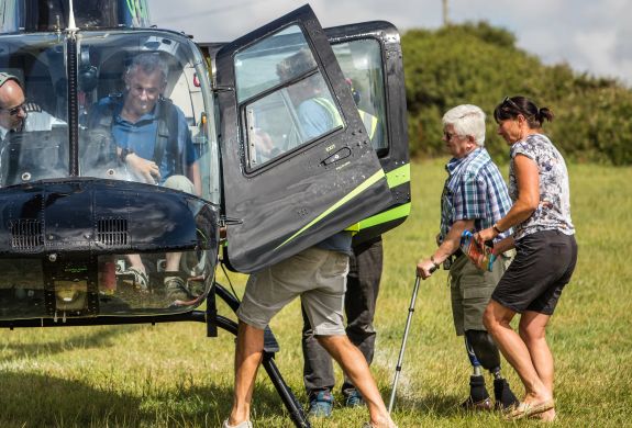 people getting into a helicopter as part of a helicopter experience day
