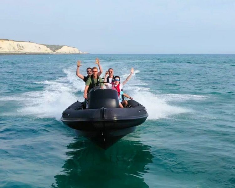 Group of people in a powerboat