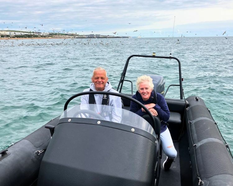 Couple in a powerboat