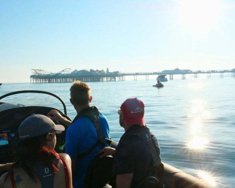 People in a speed boat