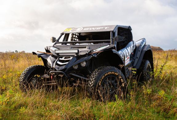a yamaha xyz1 000r dakar rally prepared yamaha on a dirt track for a jump and dirt driving experience