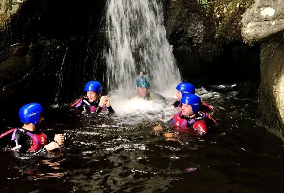 people on a canyoning experience in wales