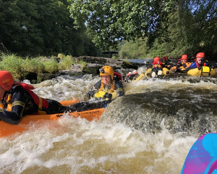 a group on a river bug experience on a river in wales