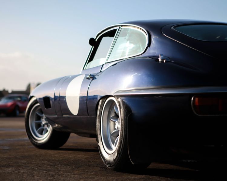 a jaguar e type sports car on a track as part of a driving experience day