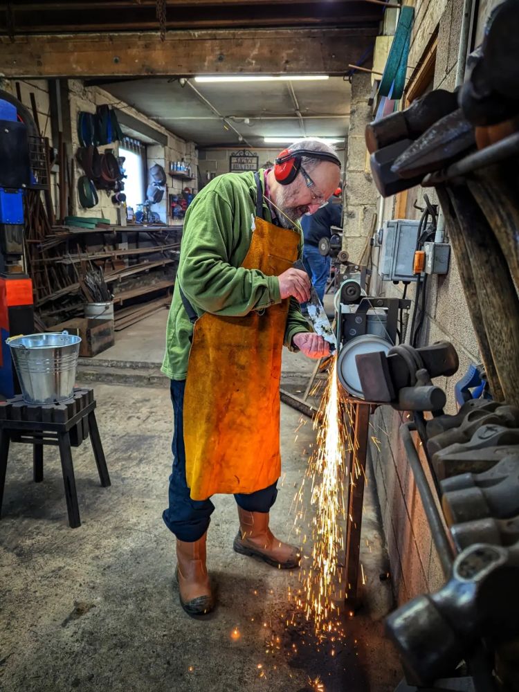 Man shaping a knife