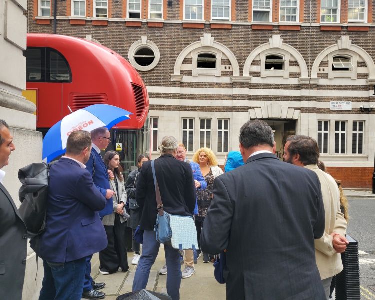 people walking through london on a james bond london tour