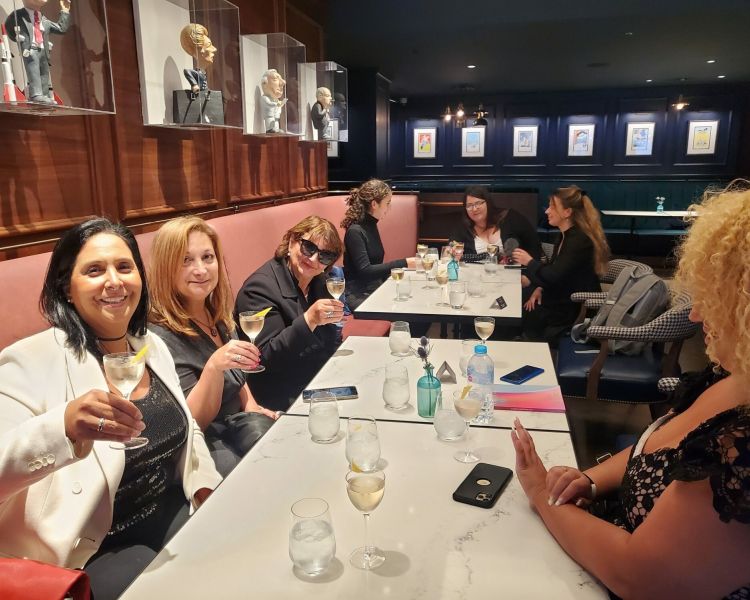 people sitting in a bar enjoying cocktails on a james bond experience day