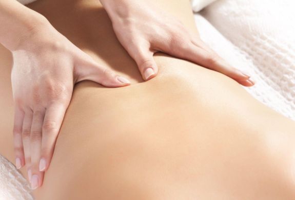 Woman having a back massage