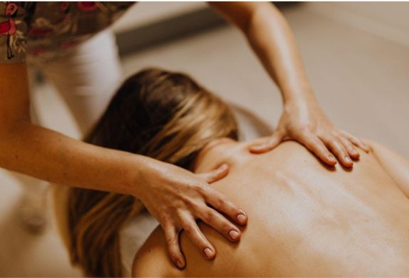 Woman having a back massage