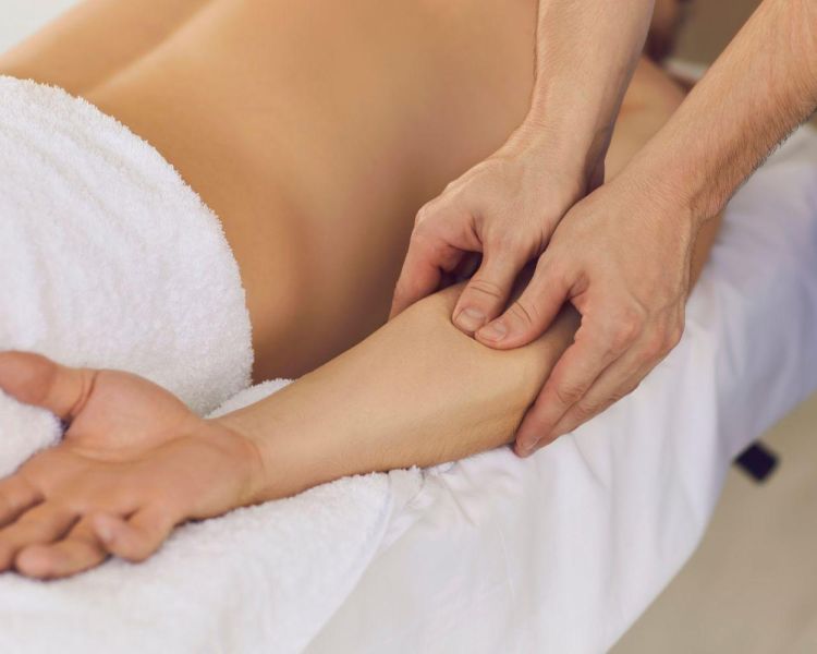 Woman having an arm massage