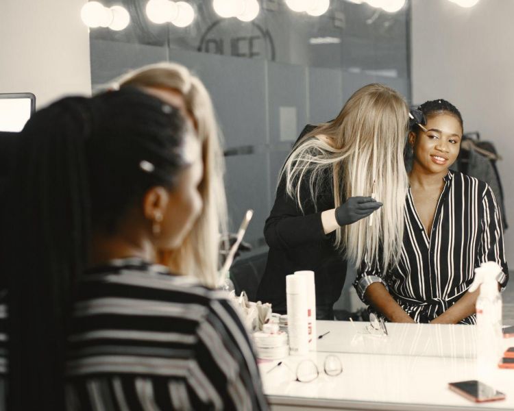 Woman having makeup applied on a makeup tutorial experience 2