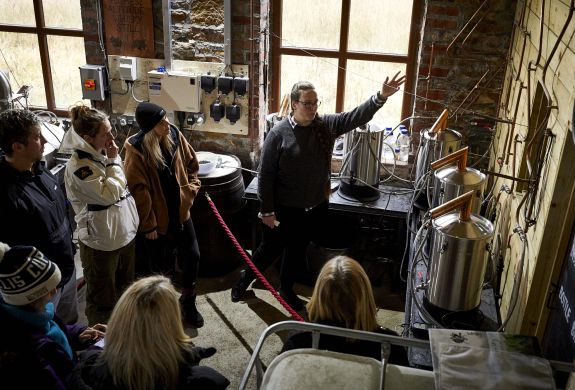 people on a distillery tour with forest distillery in cheshire