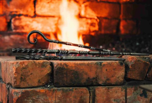 three harry potter style wands made of iron on a blacksmith experience