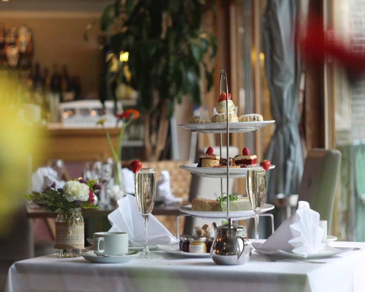 a sparkling afternoon tea laid out on a table at a country house hotel inn hertfordshire