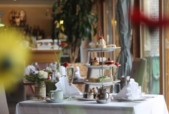 a sparkling afternoon tea laid out on a table at a country house hotel inn hertfordshire