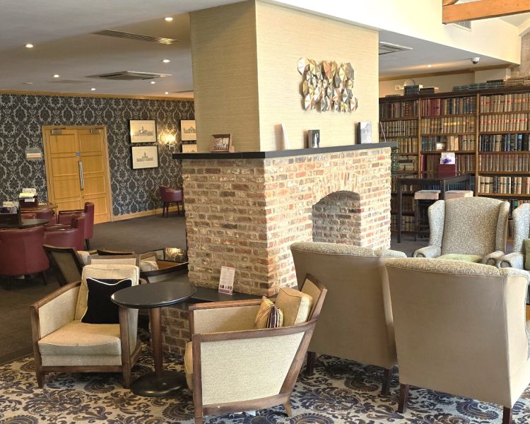 the lobby area of a country house hotel in hertfordshire