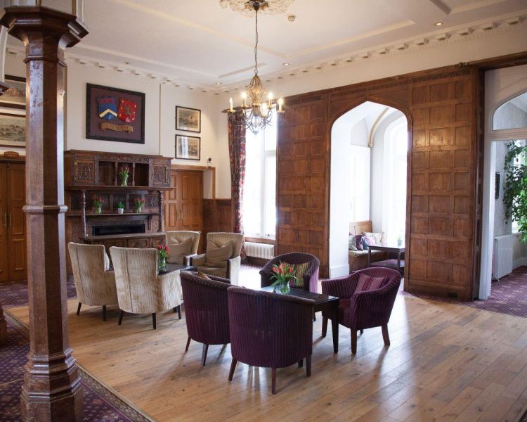 the lounge area at a country house hotel in hertfordshire