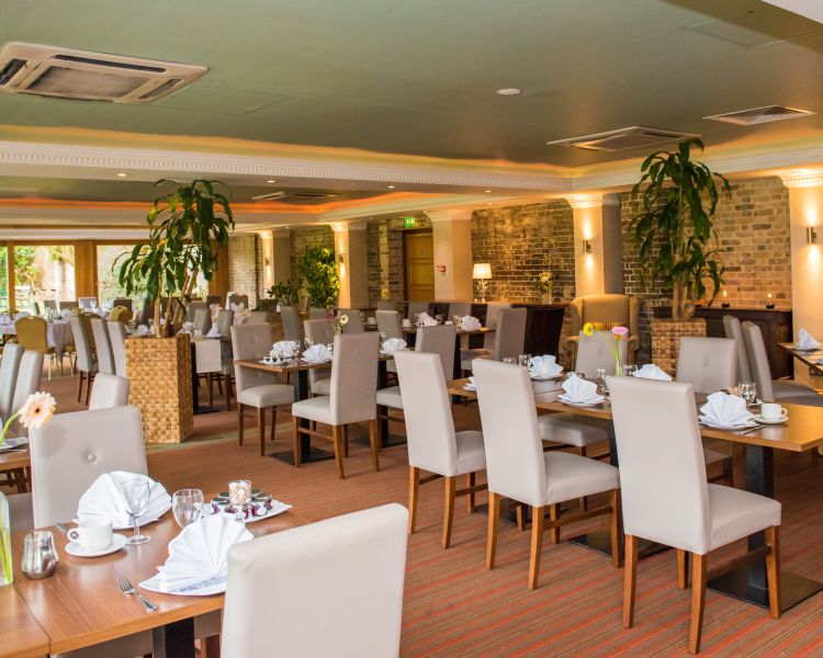 the orangery dining area at a country house hotel in hertfordshire