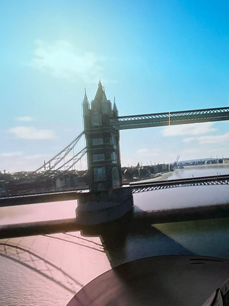 tower bridge in london seen on the screen of a spitfire flight simulator