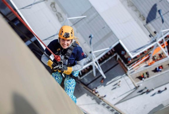 Lady abesiling down spinnaker tower