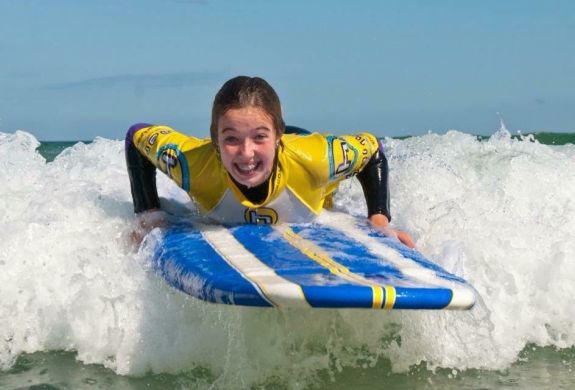 Young woman surfing