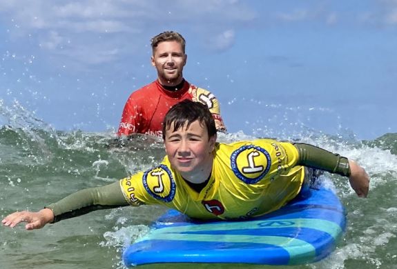 Young boy surfing