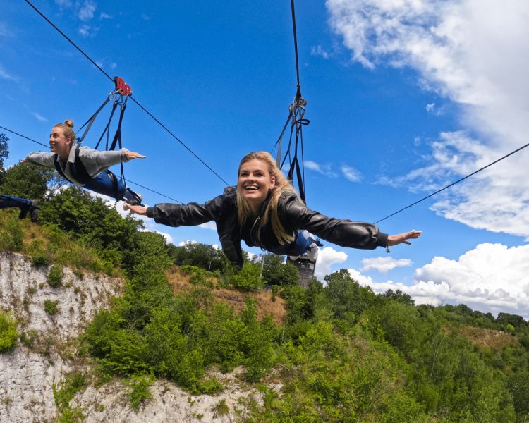 Girl flying on zipline
