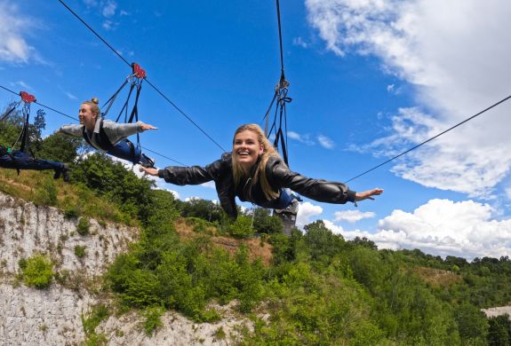 Girl flying on zipline