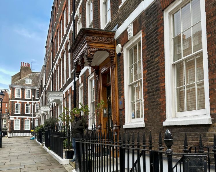 view of a row of london townhouses on james bond tour