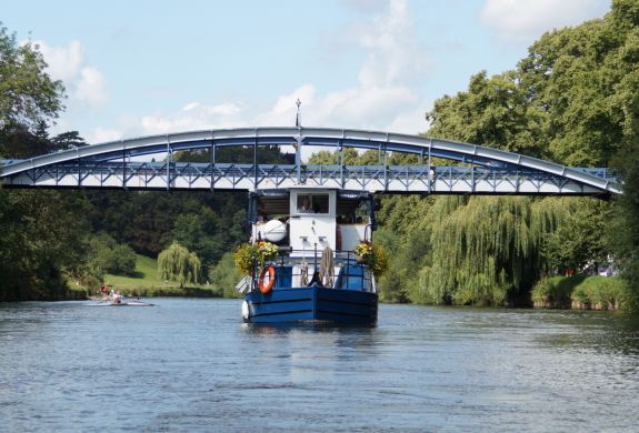 the sabrina river cruise boat sailing down the river severn on a sunny day
