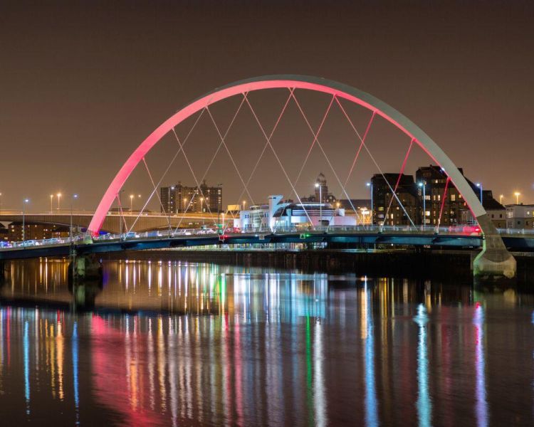 Glasgow bridge lit up at night