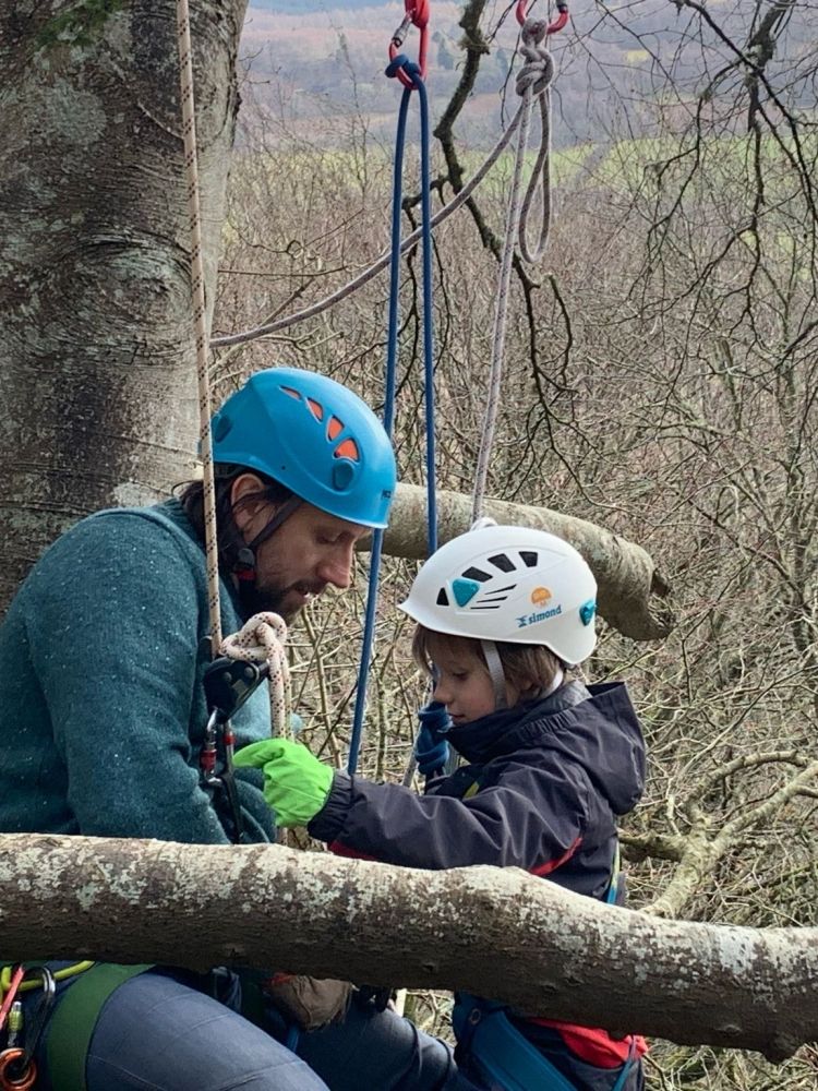 man and child on an abseiling experience in wales