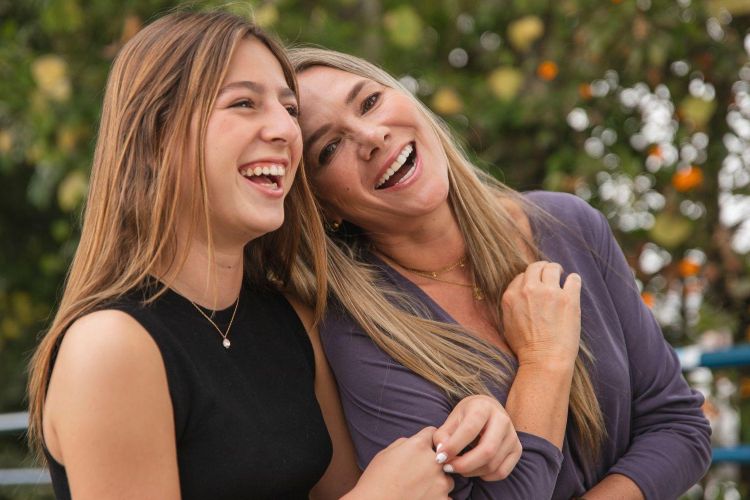 Mum and daughter laughing