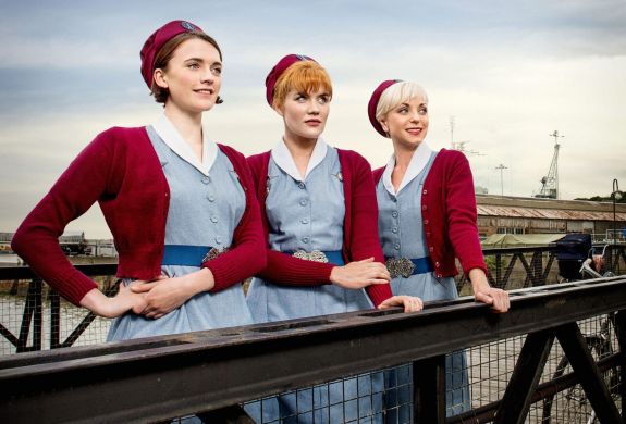 Three characters from call the midwife posing at chatham dockyard