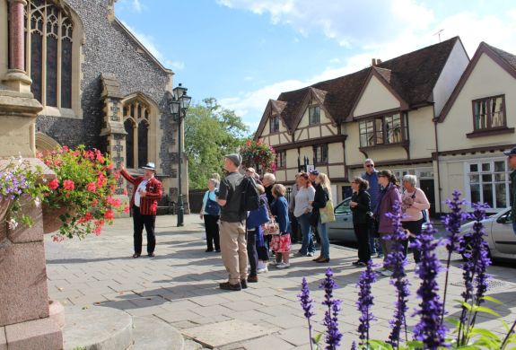 Guide talking to group in henley seen on a midsomer murders coach tour