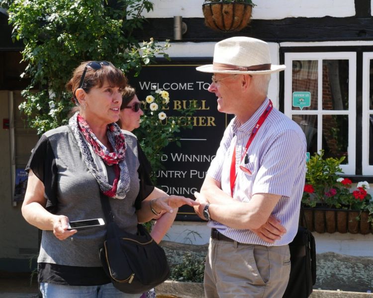 Woman talking to guide seen on a midsomer murders coach tour