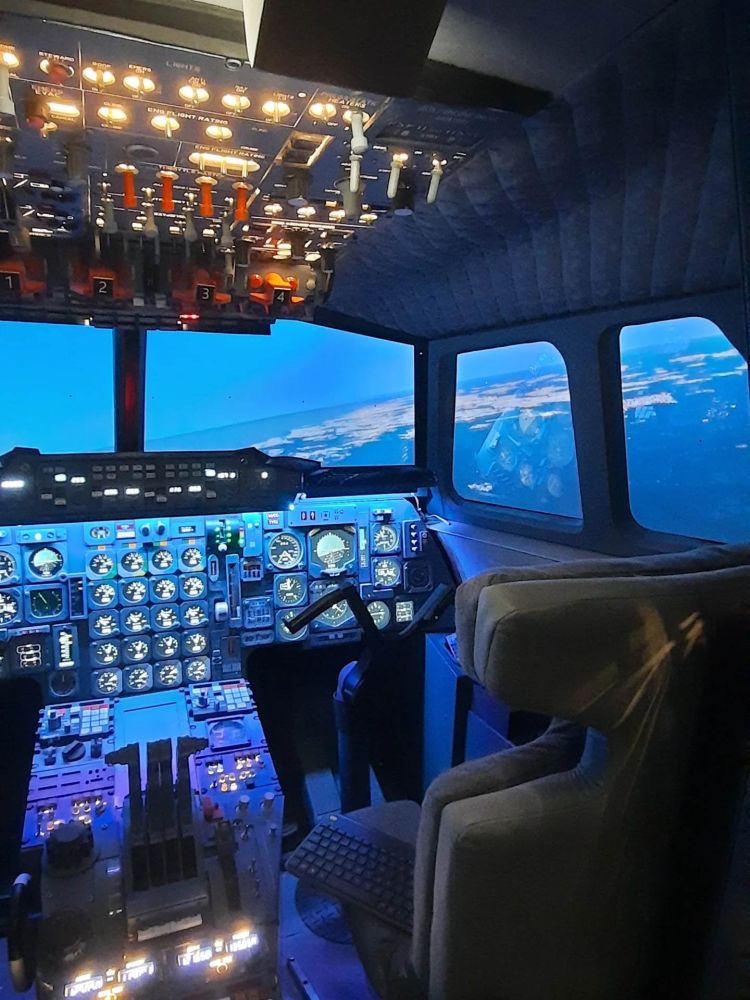 Inside of the concorde flight simulator showing the cockpit with controls